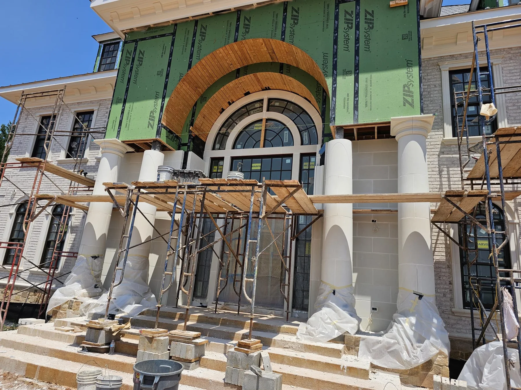 Grand masonry entry under construction